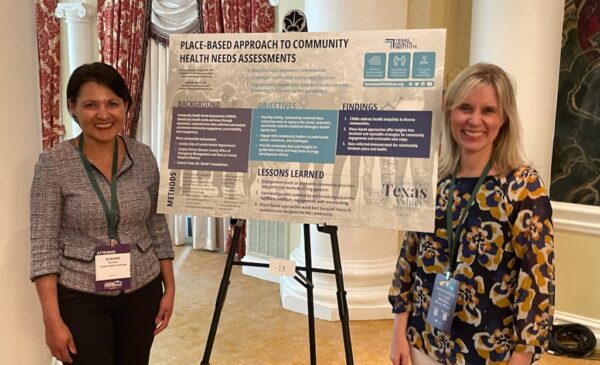 Rachelle Johnsson Chiang, DrPH, MPH, Susana Morales, MA, presenting a poster at NNPHI